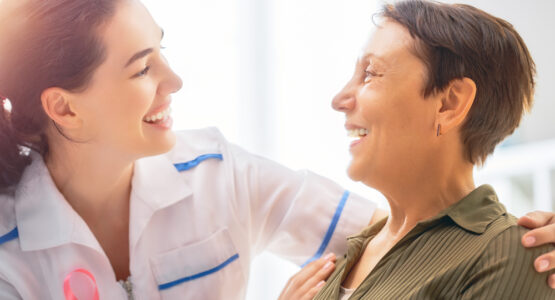 A doctor discusses breast cancer with patient at a Los Angeles Oncology Clinic.