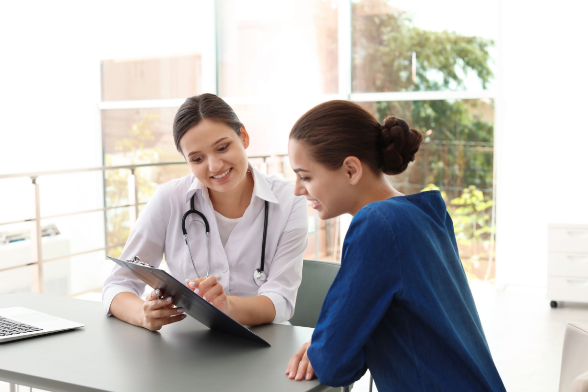Women consulting doctor