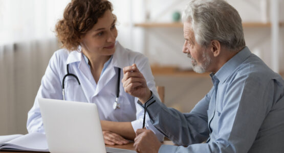 Doctor consulting patient