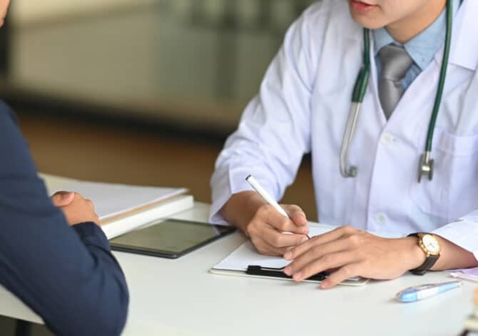 Cropped,Image,Of,Young,Smart,Doctor,Diagnosing,And,Giving,Advice