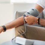 Closeup,Of,Unrecognizable,Male,Patient,Using,Modern,Tonometer,At,Home,